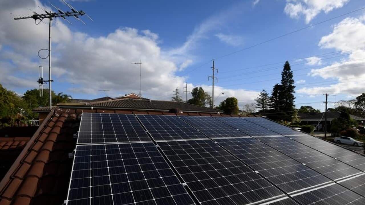 Solar panels are seen on the roof of a house in Sydney.