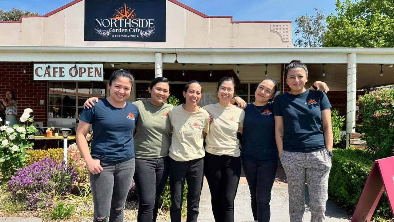 Canberra entrepreneurs Lovelyn Natividad, Chef Mikaela Sarmiento, and Clarice Miranda, with their team. 