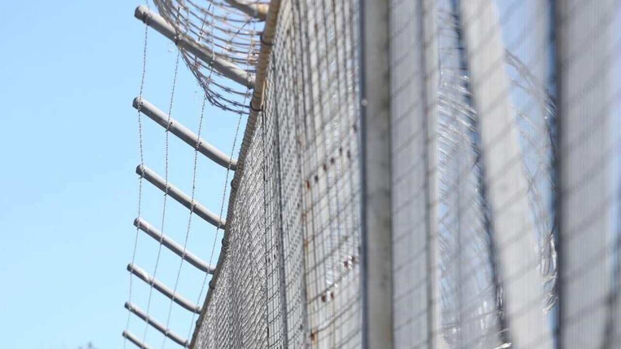 A representational image of a prison.