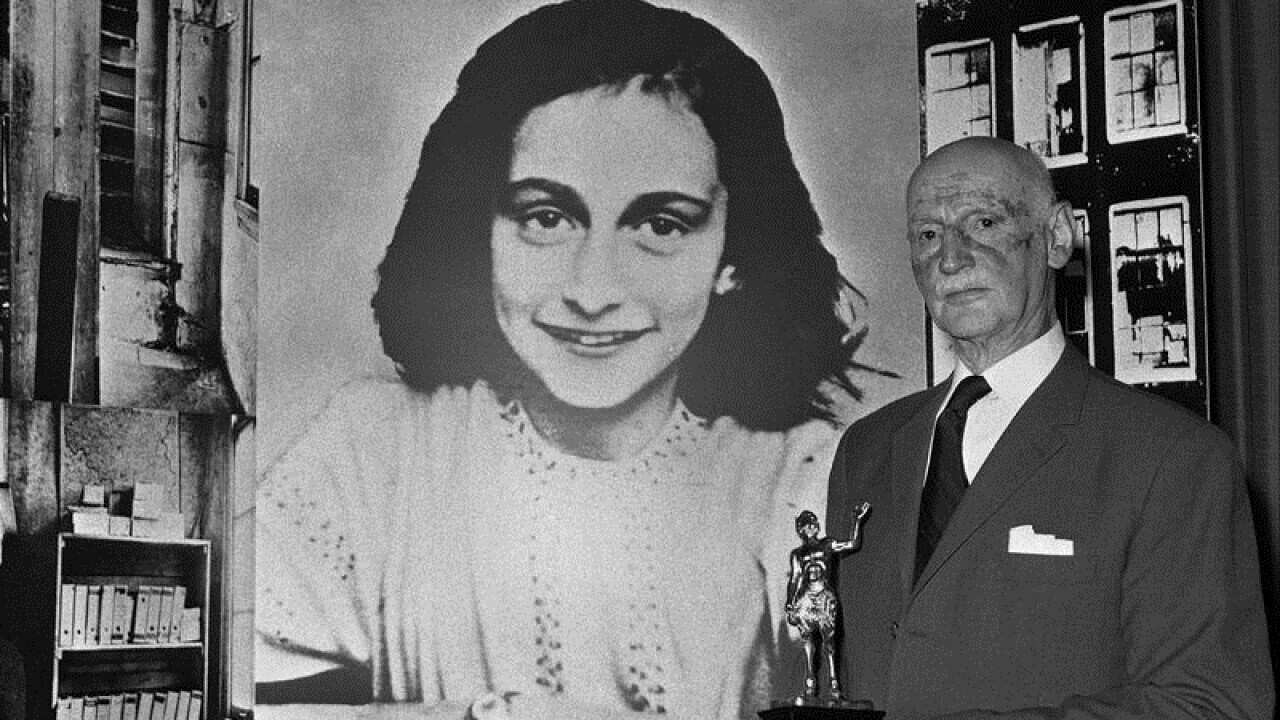 Otto Frank with a picture of his diarist daughter Anne Frank.