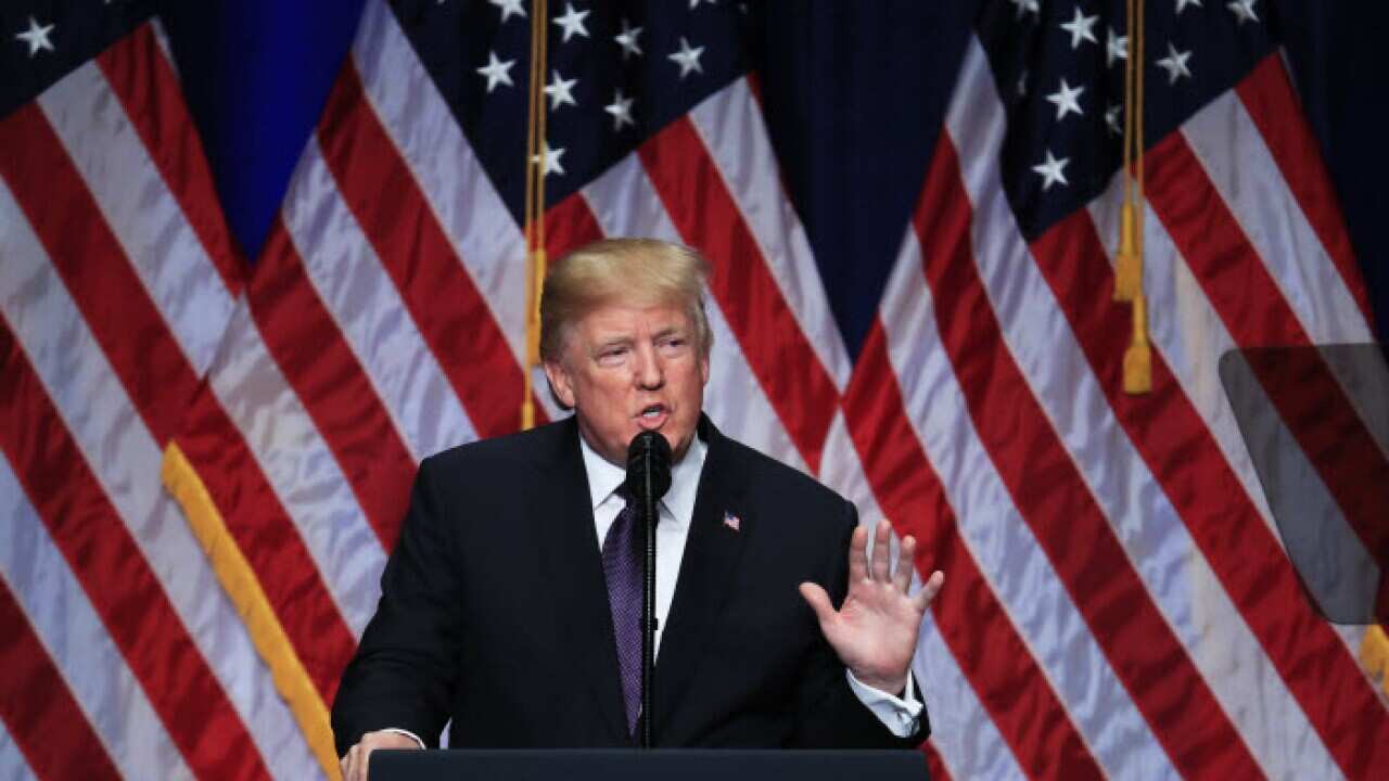 President Donald Trump speaks and lays out a national security strategy