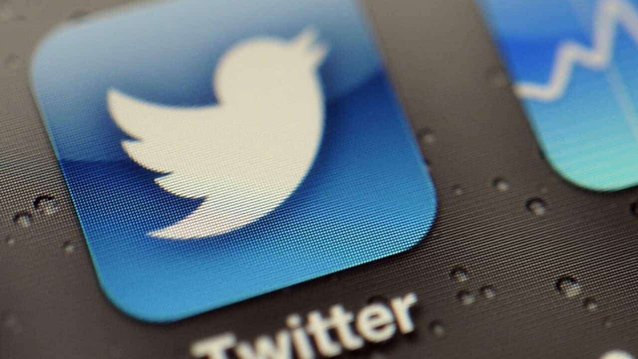 Twitter App and stock tracker on an iPhone