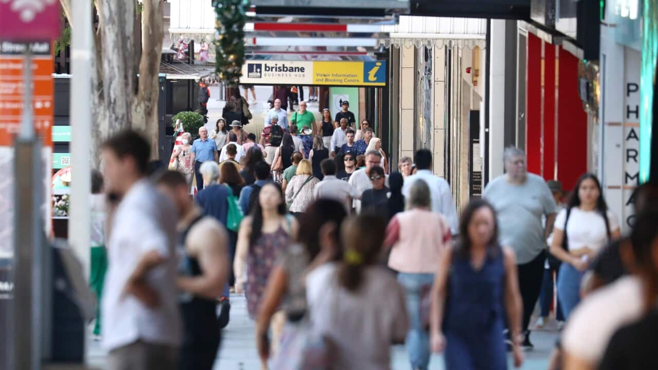 People walking down a street in Brisbane