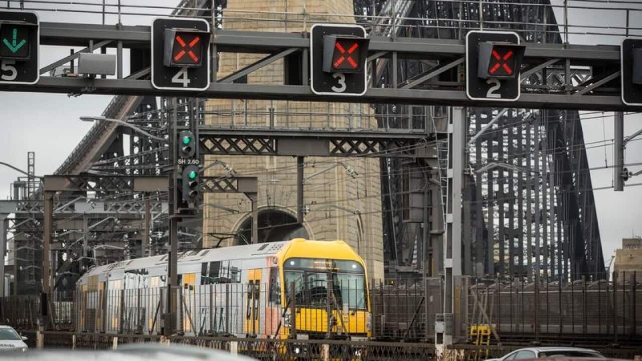 A train approaches Milsons Point railway station in Sydney.