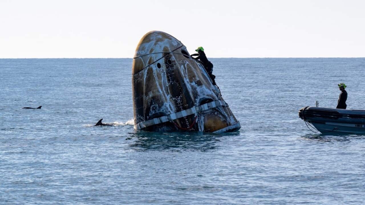 SpaceX Crew Dragon capsule returns stranded NASA sstronauts to Earth (AAP).jpg