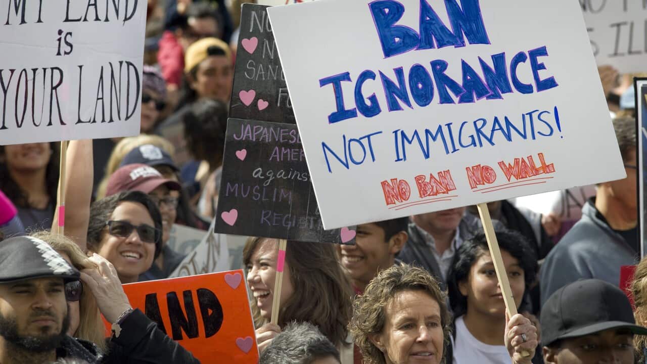 People participate in a march rally in support of immigrants and refugees in San Diego, California, USA, 18 February 2017. 