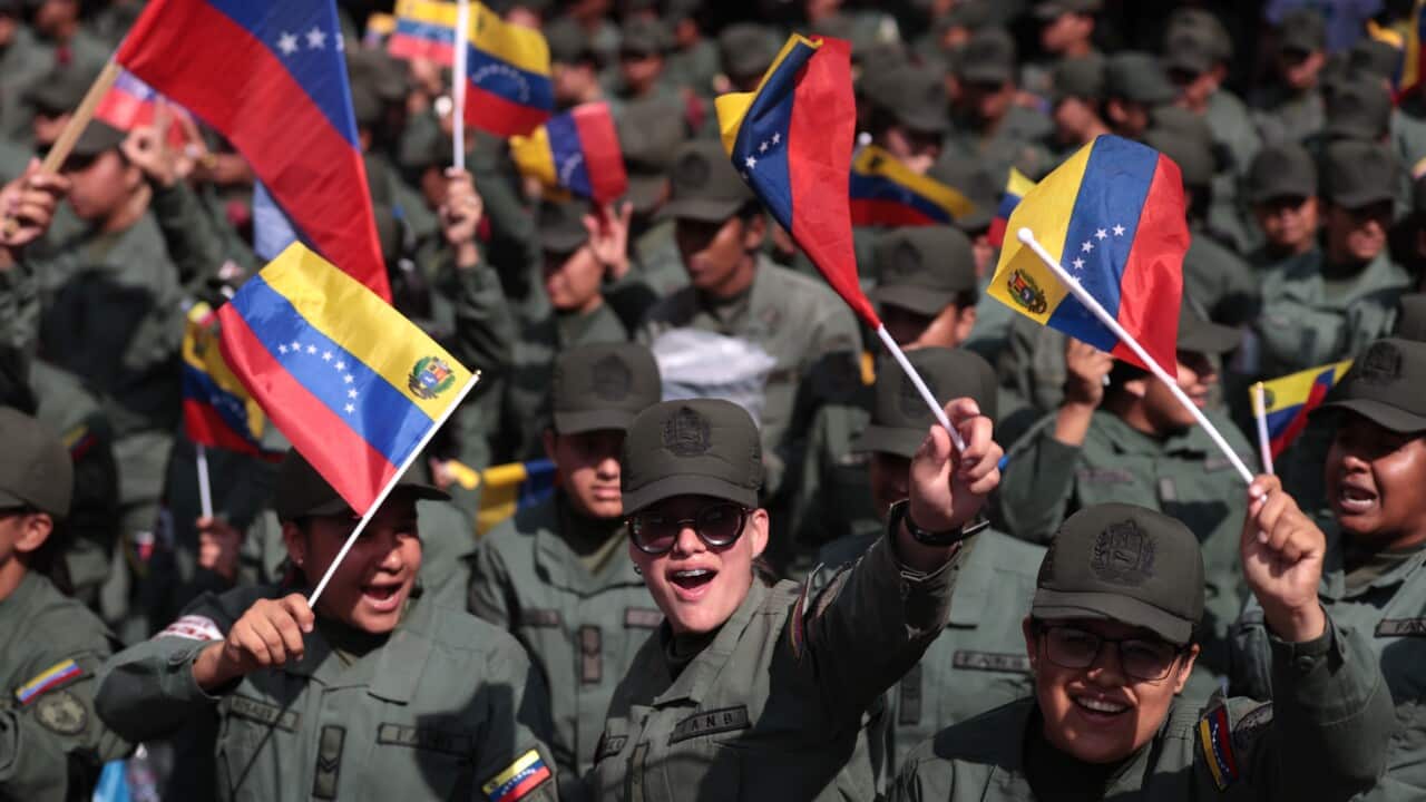 Chavista women march in Caracas in support of Delcy Rodriguez after she assumes the presidency