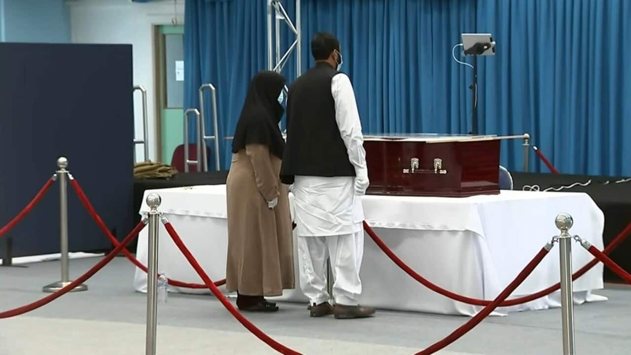 The parents of Ayaz Younus grieve in silence before the funeral