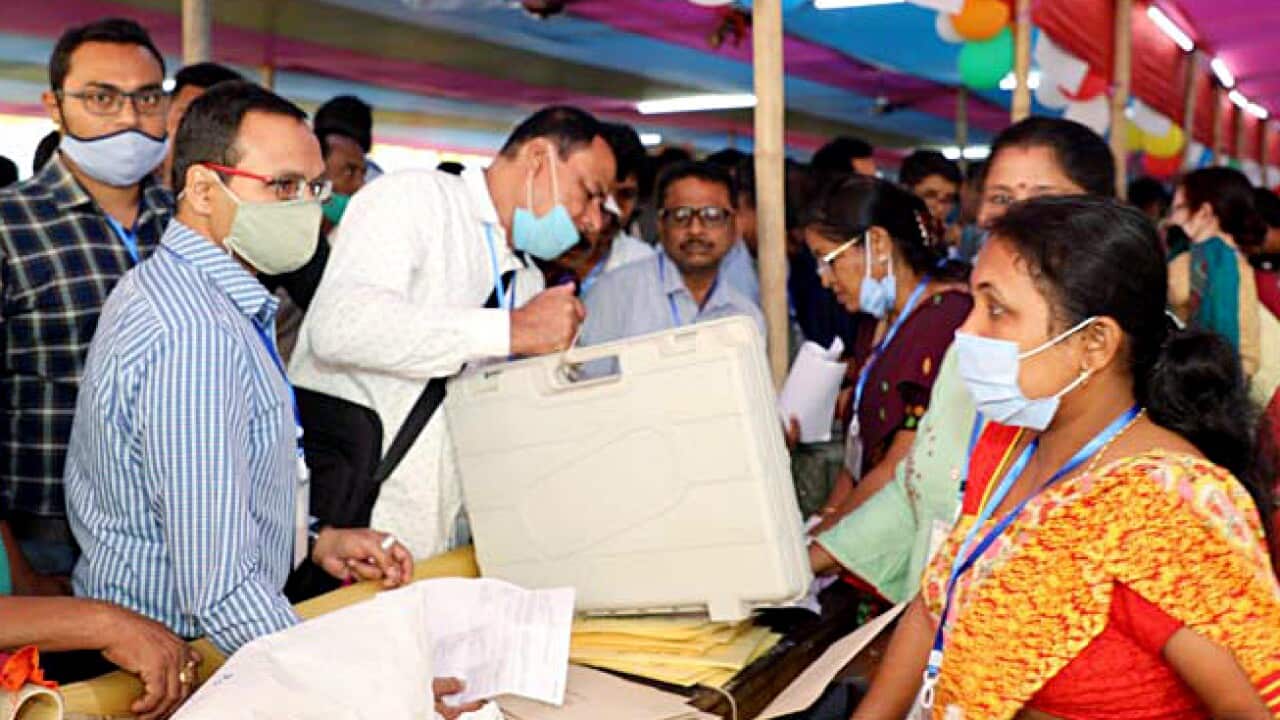 Polling officials collecting the Electronic Voting Machine (EVMs) and other necessary inputs required for the Assam Assembly Election