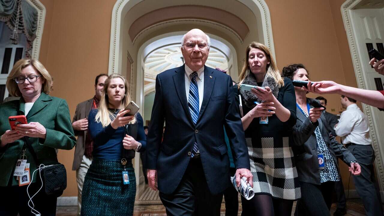 Reporters follow Democratic Senator from Vermont Patrick Leahy (C) after he joined other appropriators for border security talks on 11/2/19.
