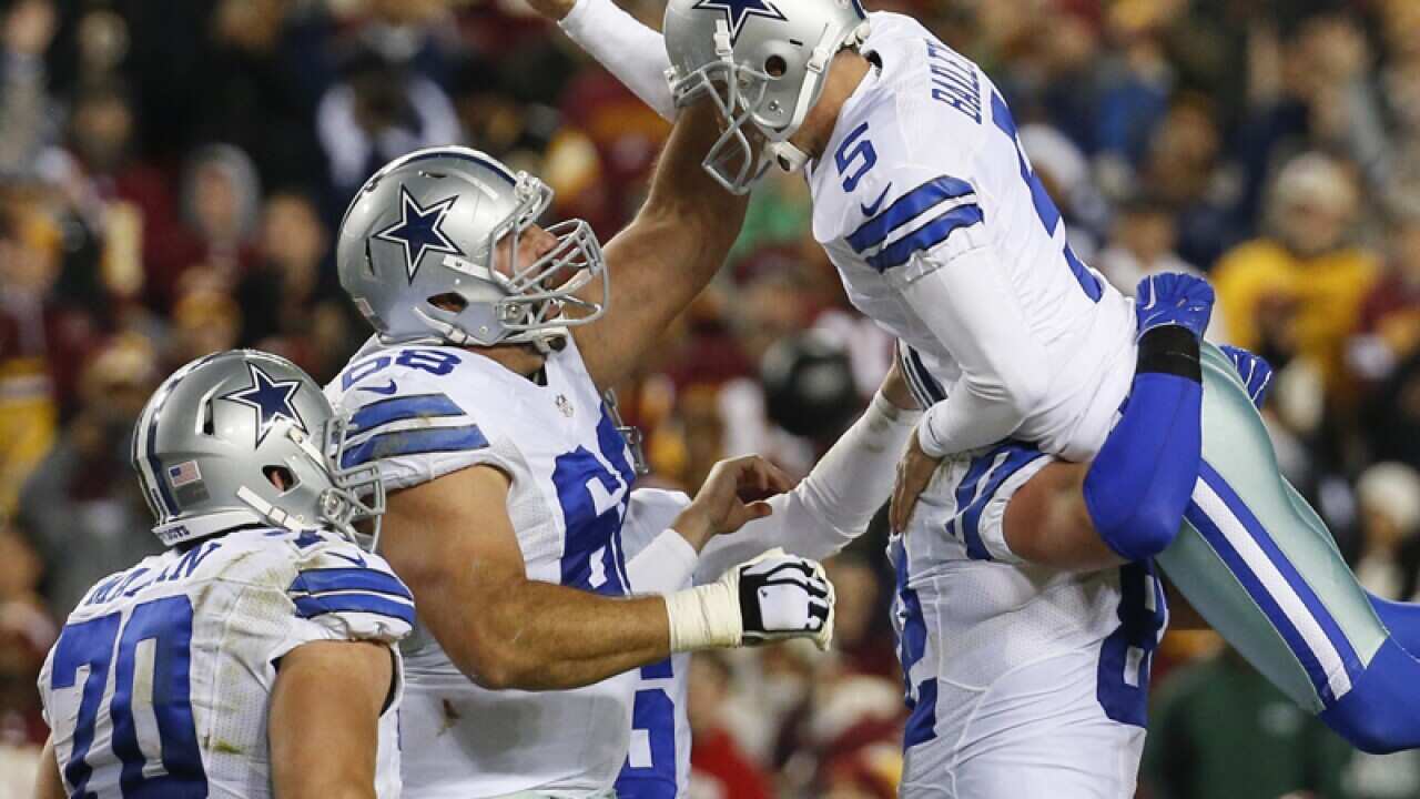 Dallas Cowboys kicker Dan Bailey (5) celebrates with his teammates