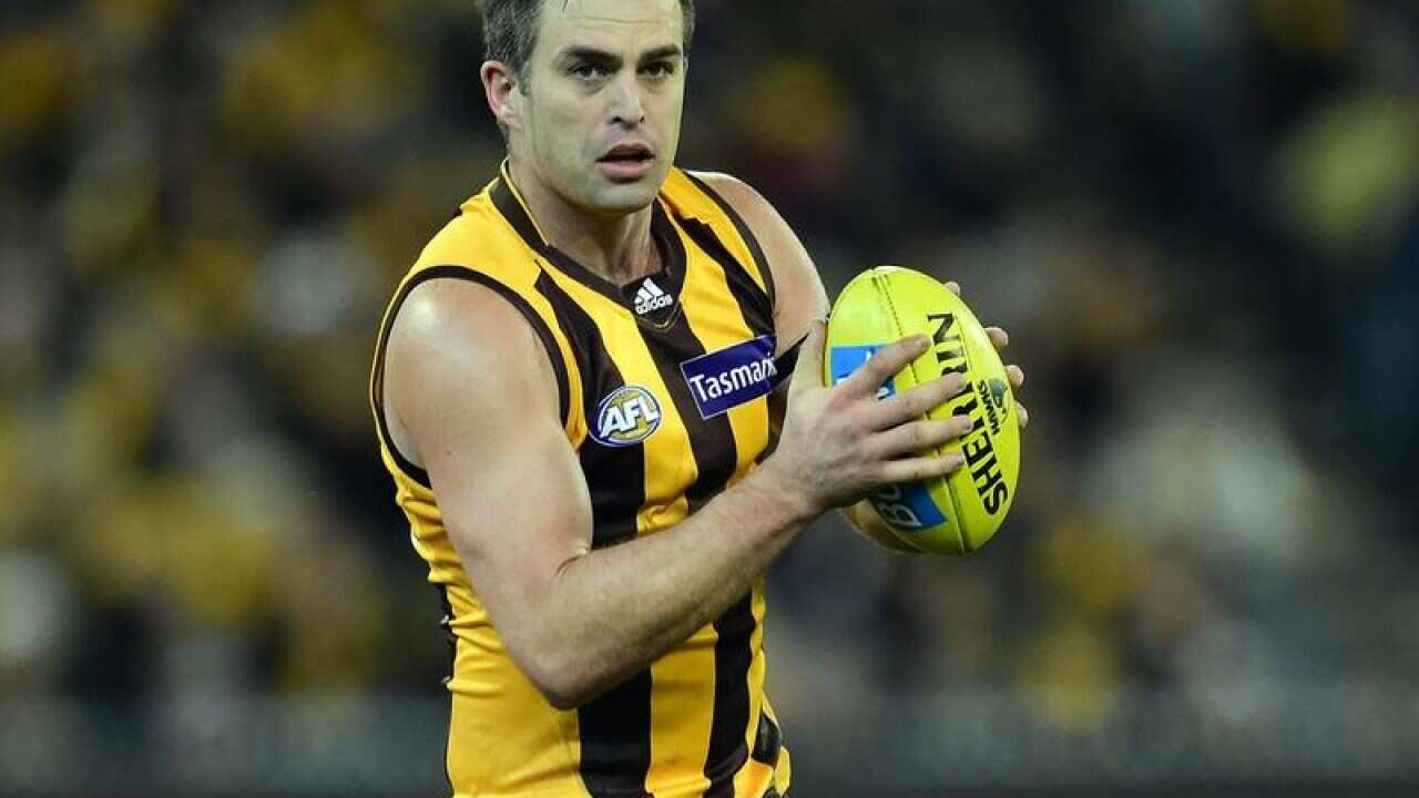 Former Hawks player Brian Lake in action.