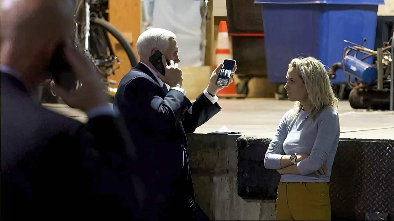 Former US Vice President Mike Pence talking on a phone from a secure evacuation location during the Capitol riot in 2021 (AAP)