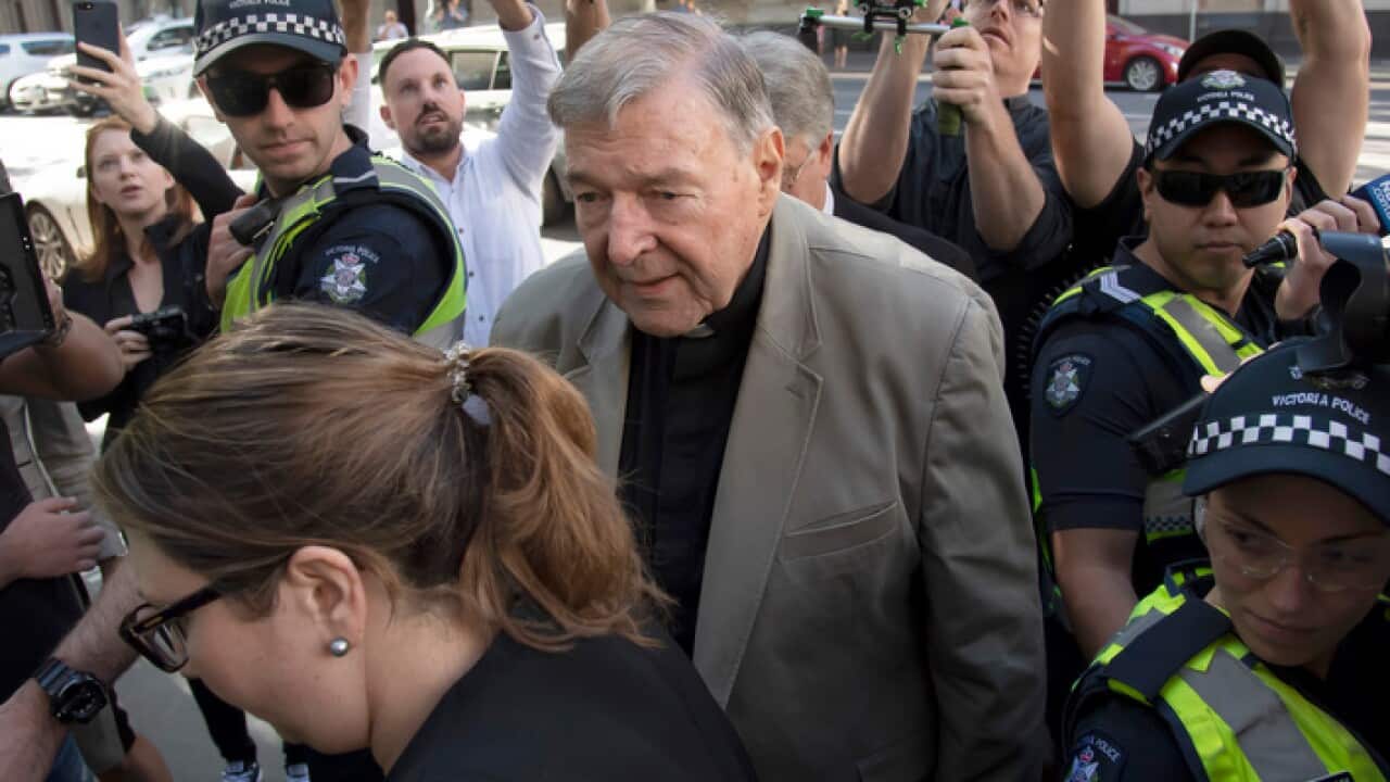 Cardinal George Pell arrives at the County Court in Melbourne, Australia, for his pre-sentencing hearing