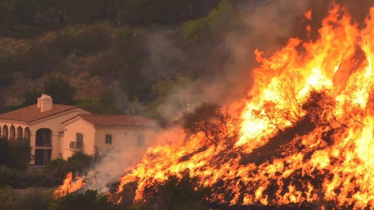 US wildfire remains a threat to 18,000 homes and other structures in Santa Barbara and other areas.