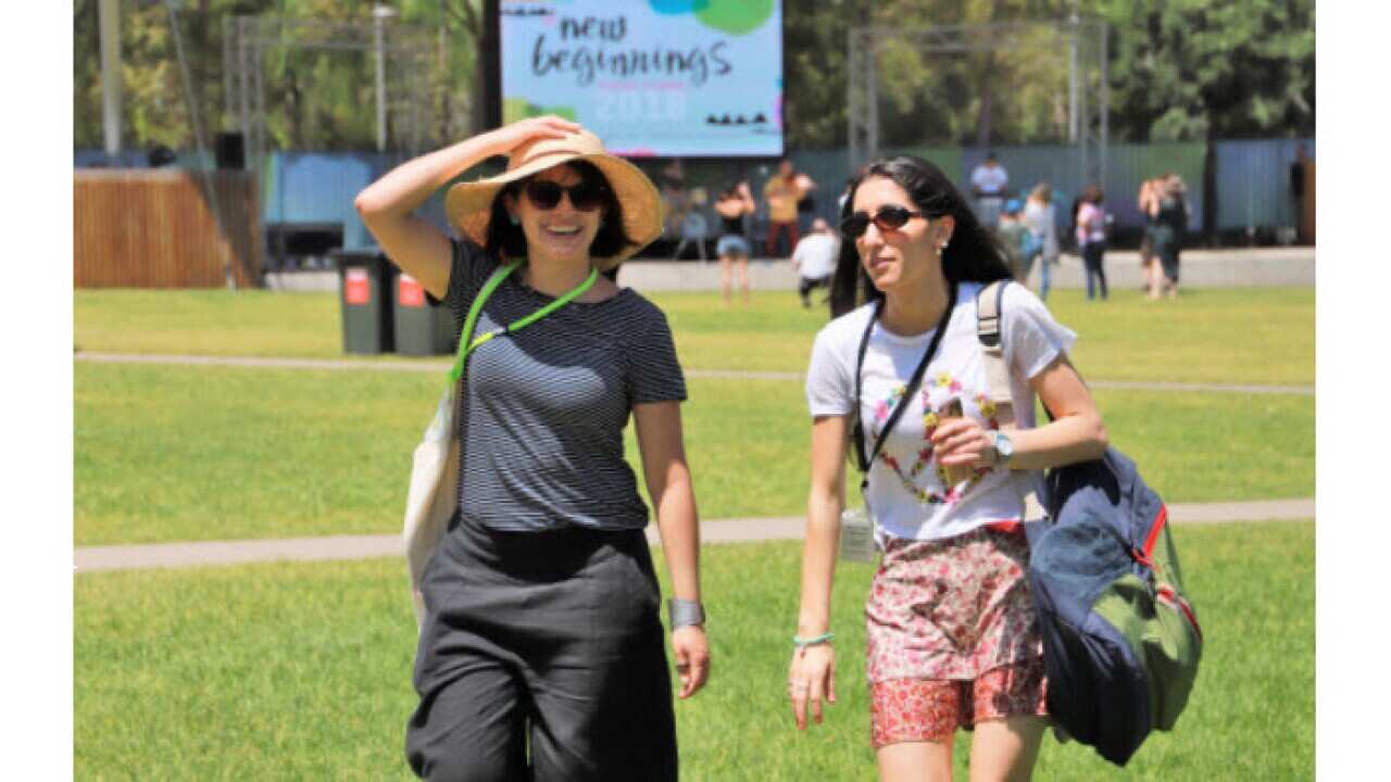 Carolina Triana (left), SSI Arts and Culture program manager