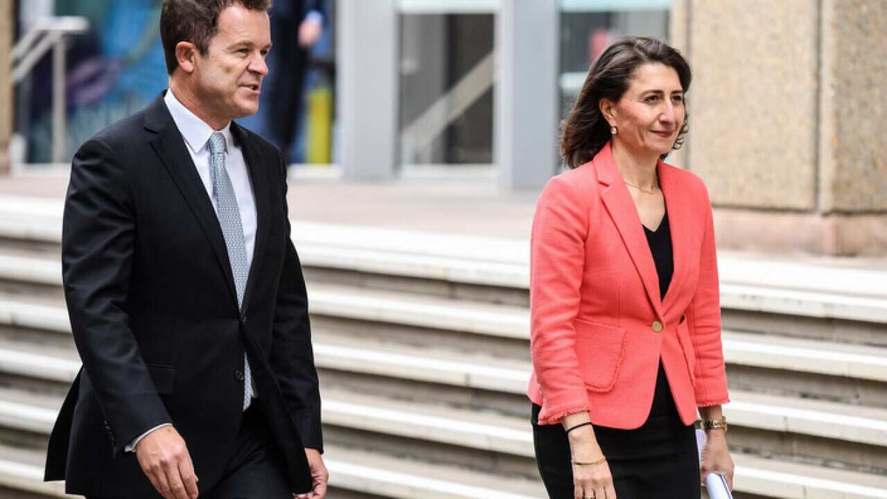 NSW Premier Gladys Berejiklian (right) and Attorney General Mark Speakman arrive at a press conference in Sydney