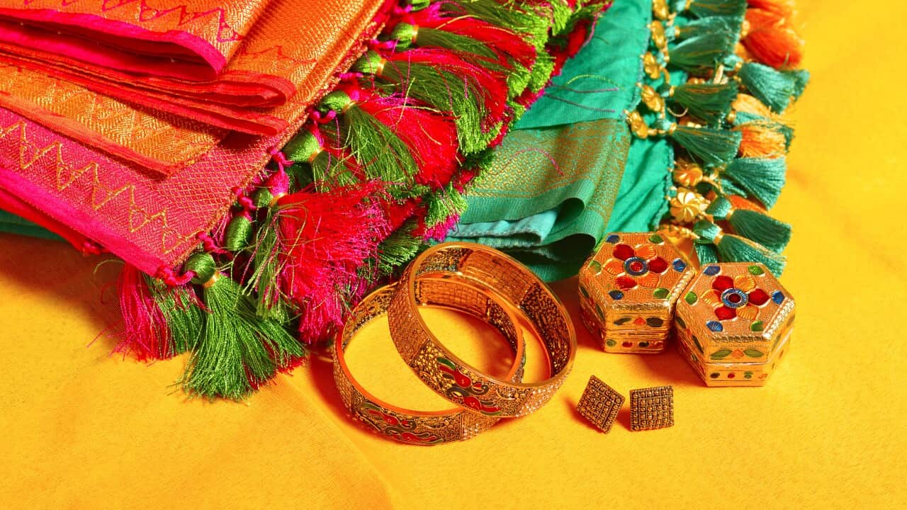 Indian women sarees with jewelry accessories, Maharashtra