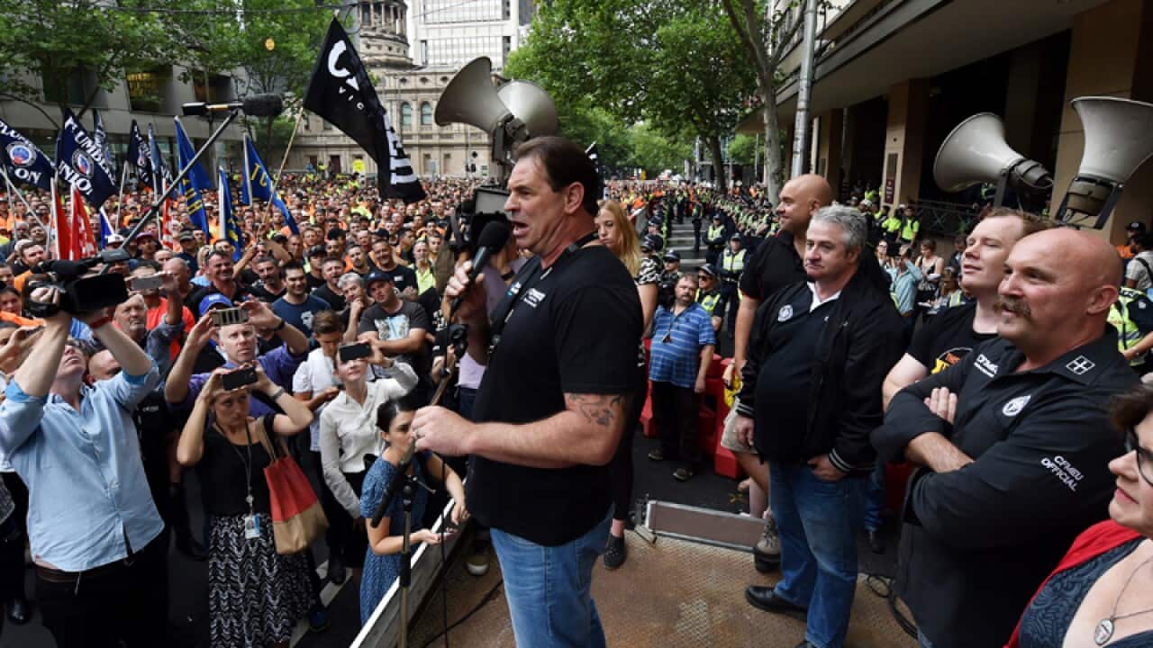 CFMEU Victoria secretary John Sekta speaks during a protest