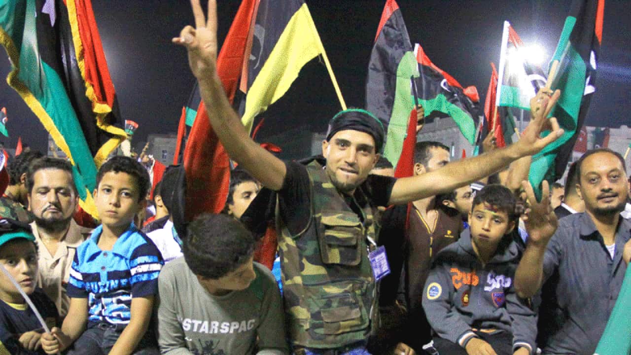 Libyans poured into the streets to celebrate the news of Muammar Gaddafi's death, Tripoli. (AAP)