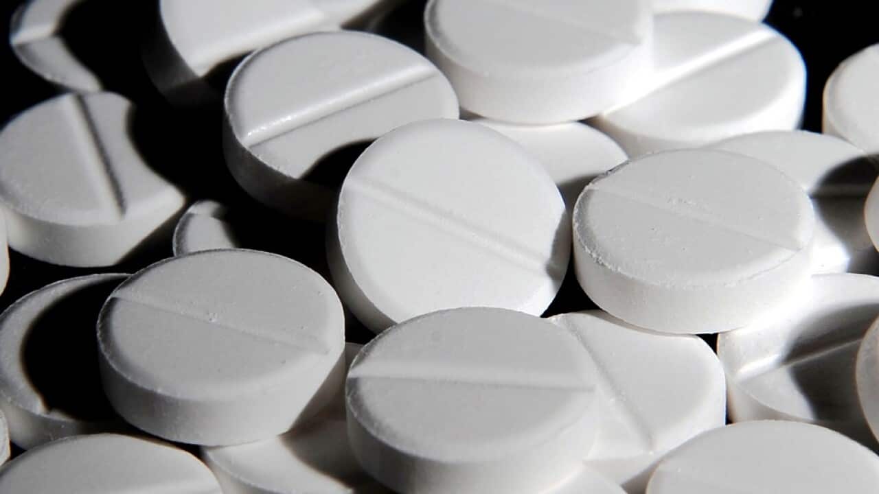 Close-up of many white tablets