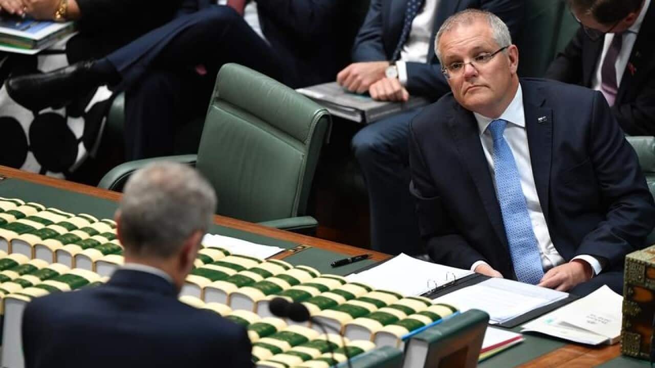 Leader of Opposition Bill Shorten and Prime Minister Scott Morrison (R