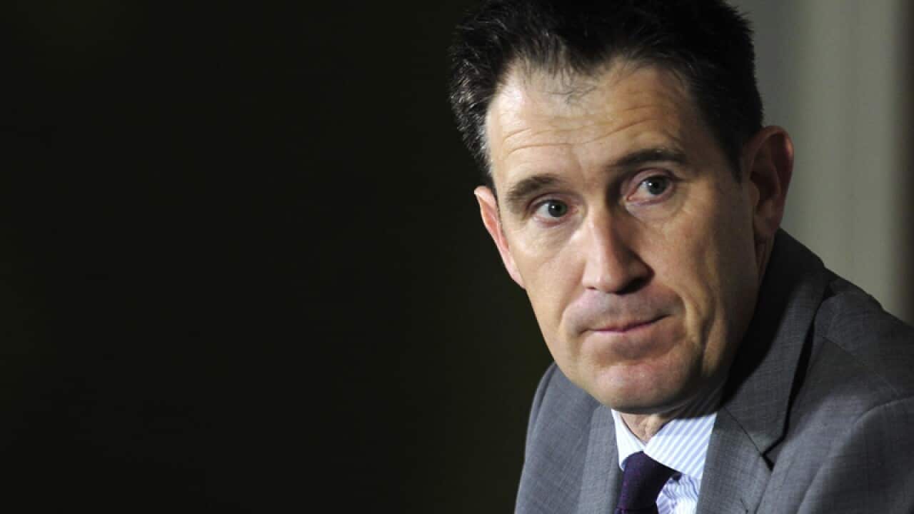 James Sutherland at a media conference.