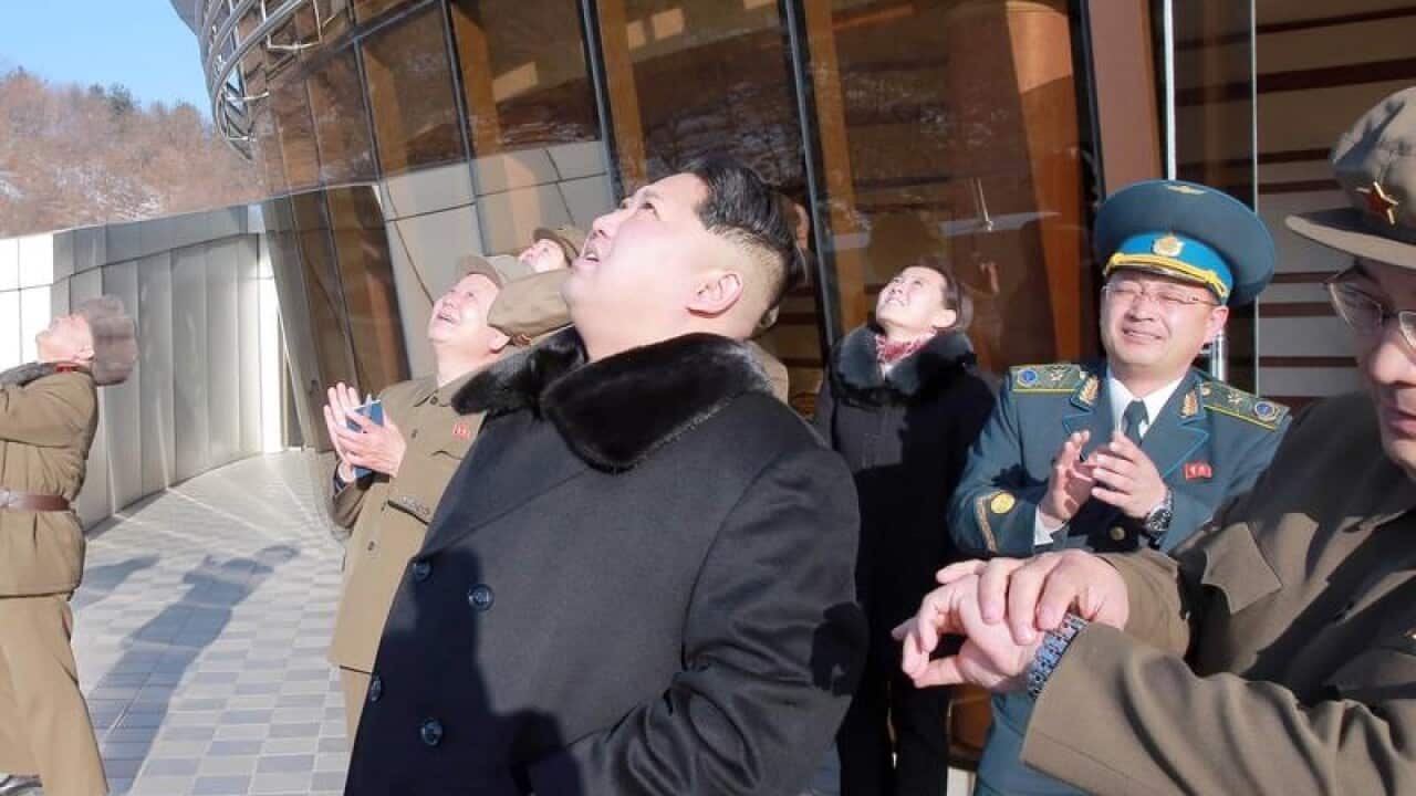 A file image of Kim Jong-un watching the 2016 missile launch