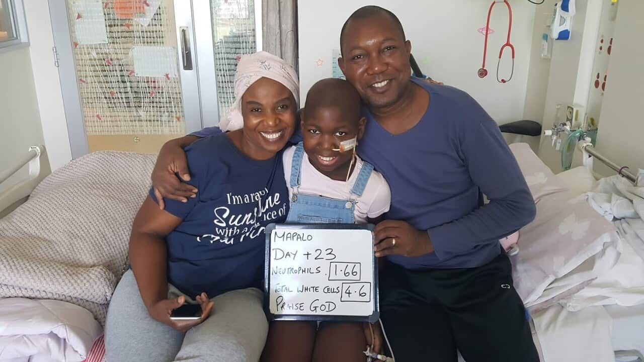 11-year-old sickle cell disease survivor Mapalo Joy Nsofwa with her mother Agnes and father Preston.