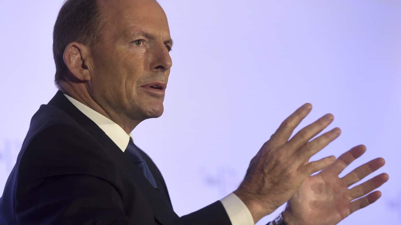 Former Australian Prime Minister Tony Abbott responds during a question and answer session after delivering a lecture at the Fullerton Hotel in Singapore on Wednesday, Dec. 9, 2015 (AP Photo/Joseph Nair)