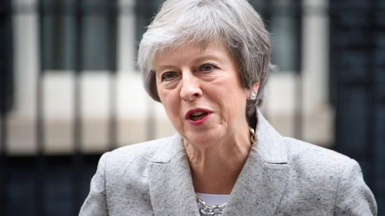 Theresa May delivers her statement outside No 10