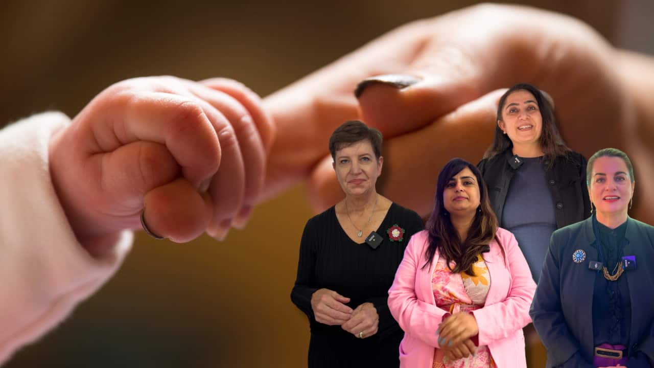 A mother holds her baby's foot. Sunday (11.05.2025) is Mother's Day.