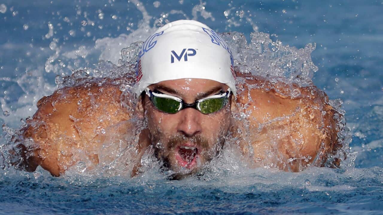 Michael Phelps competes in the 200-meter butterfly final