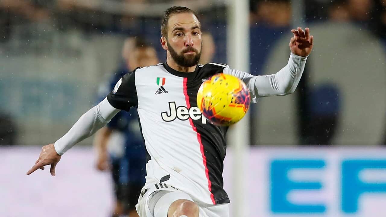 Juventus' Gonzalo Higuain controls the ball during the Serie A soccer match between Atalanta and Juventus at the Gewiss stadium, in Bergamo, Italy, Saturday, Nov. 23, 2019. (AP Photo/Antonio Calanni)