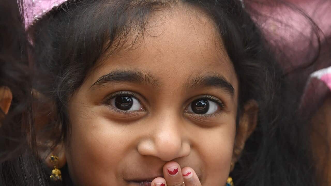 , Sunday, June 12, 2022. The family of Tamil asylum seekers have returned to their home in the central Queensland town of Biloela after more than four years in detention. (AAP Image/Darren England) NO ARCHIVING