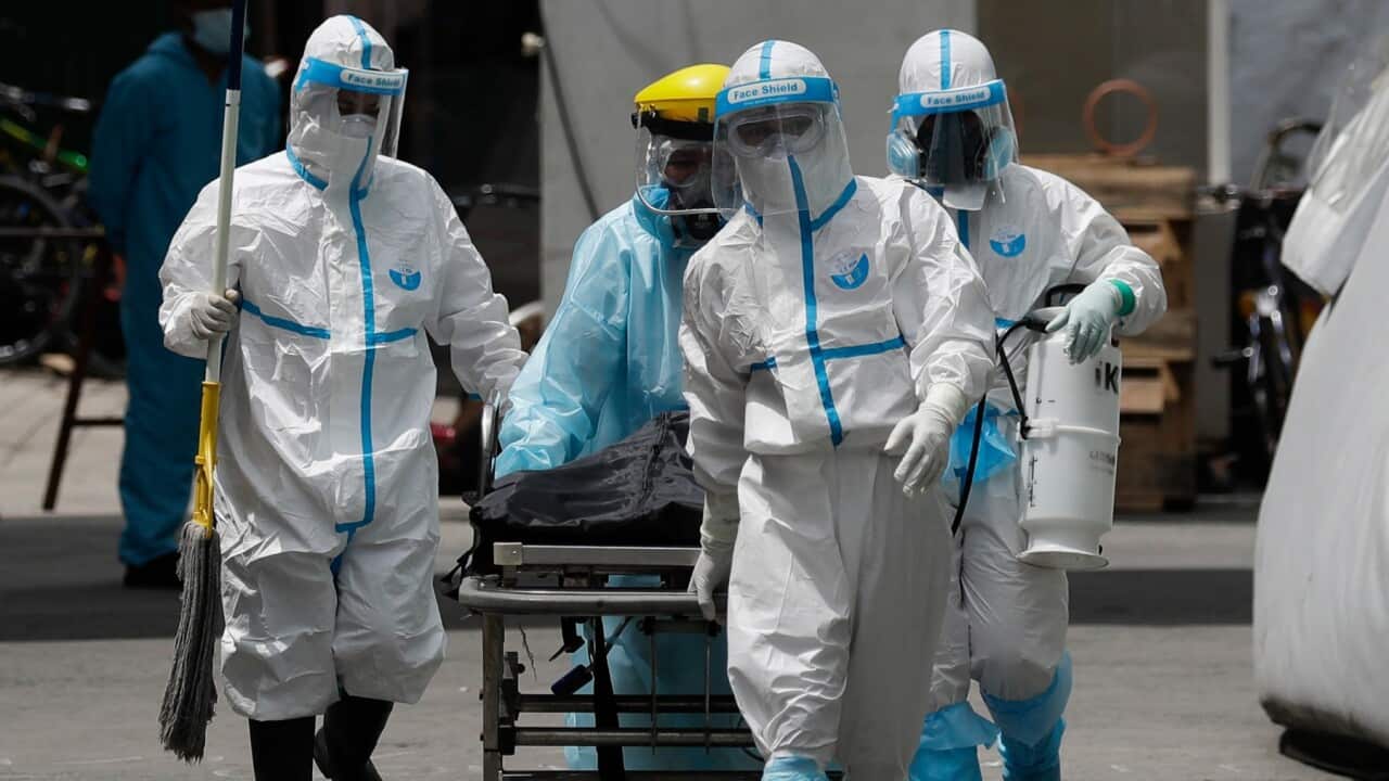 Covid front liners help transport patient