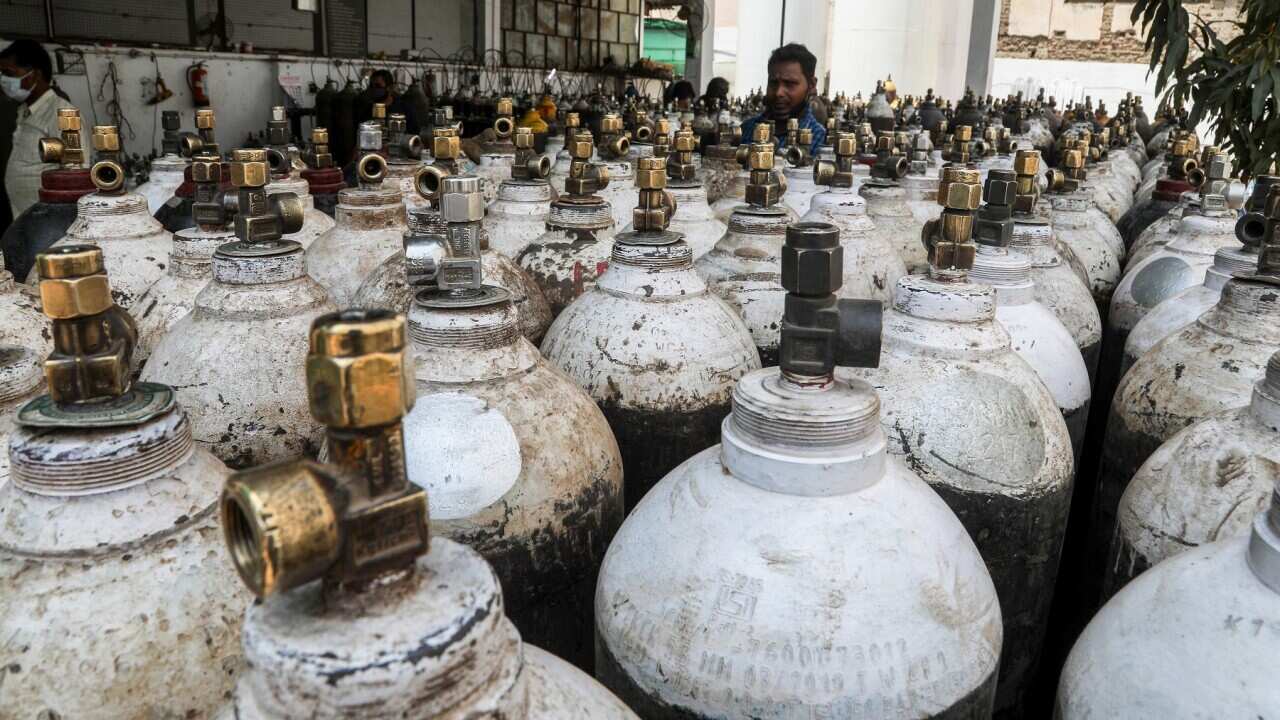 Medical oxygen cylinders at a charging station in New Delhi