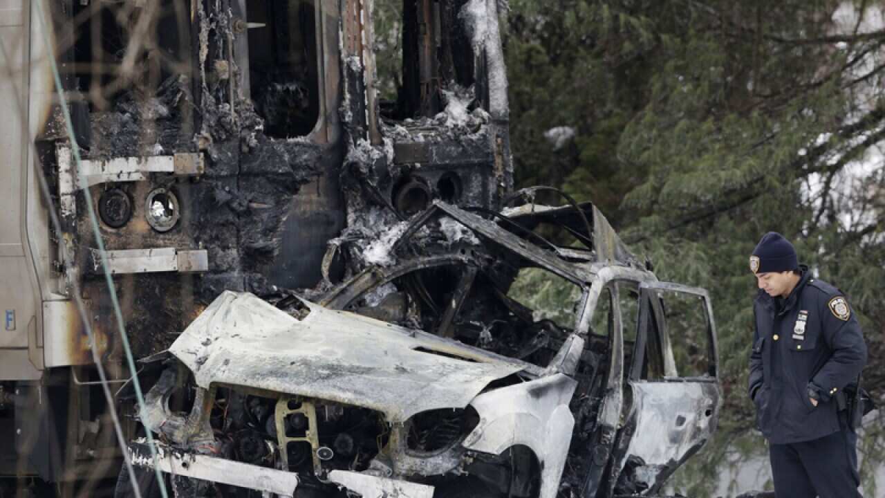 A car that was crushed at the front of a Metro-North train in New York