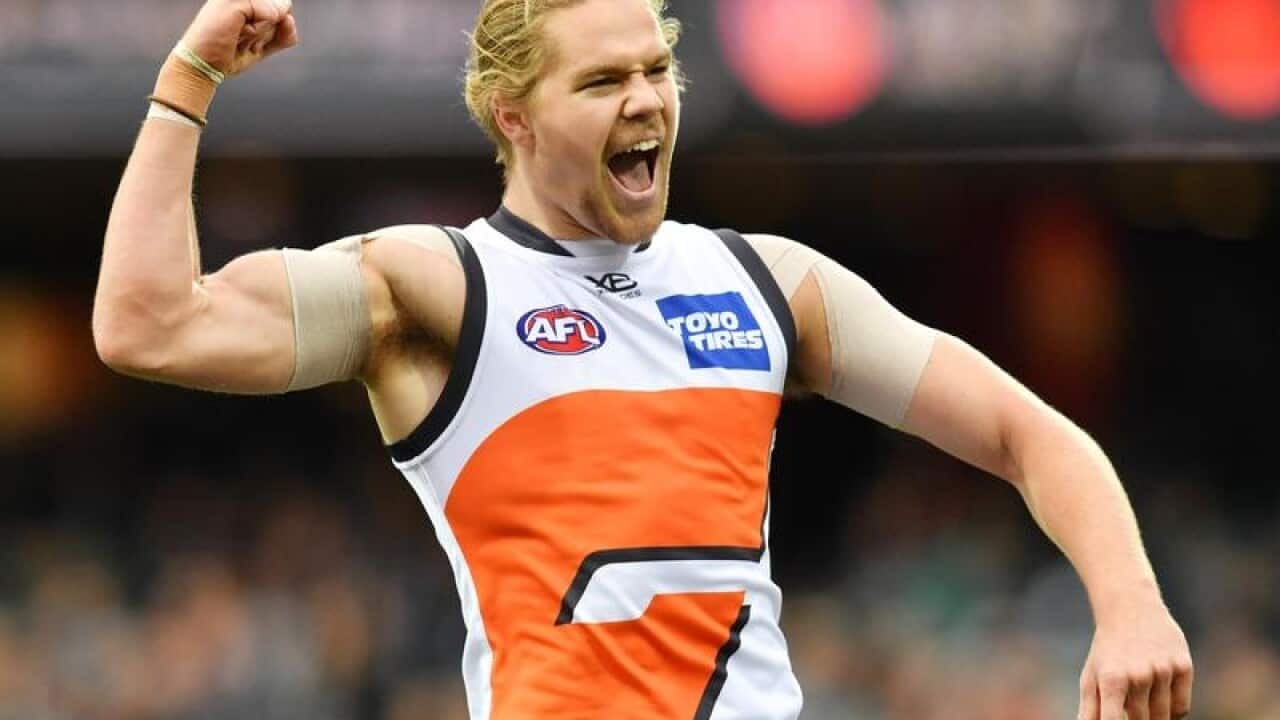 Harry Himmelberg of the Giants celebrates after kicking a goal