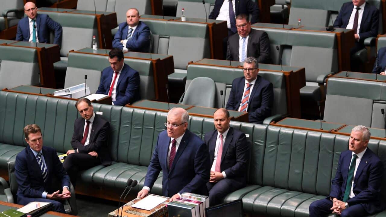 MPs sitting under rules of social distancing at Parliament