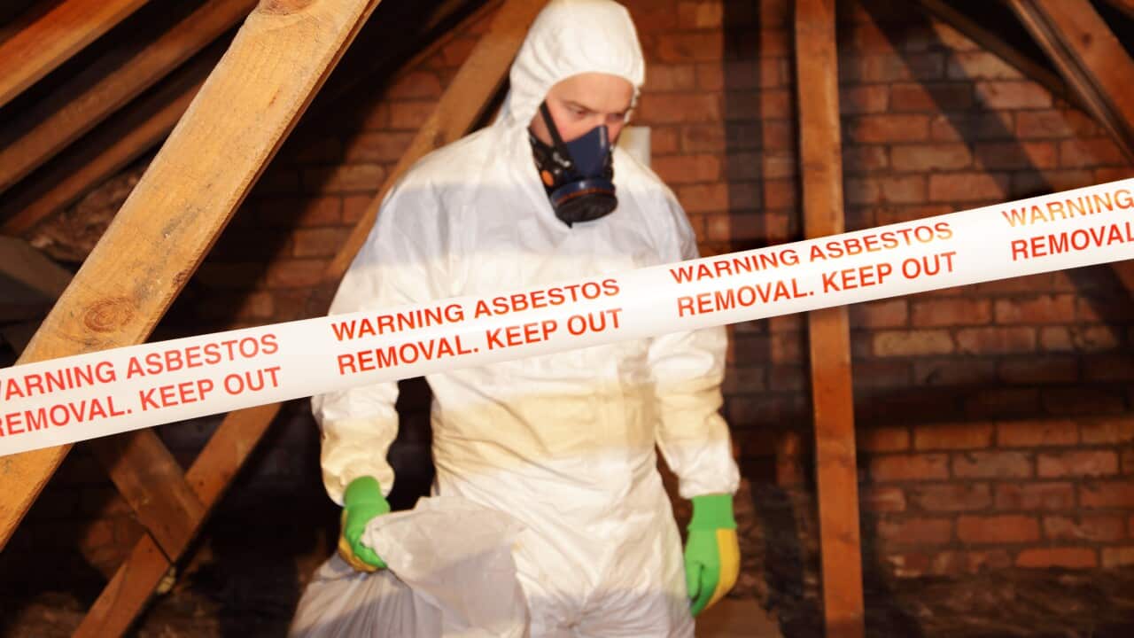 man removing asbestos