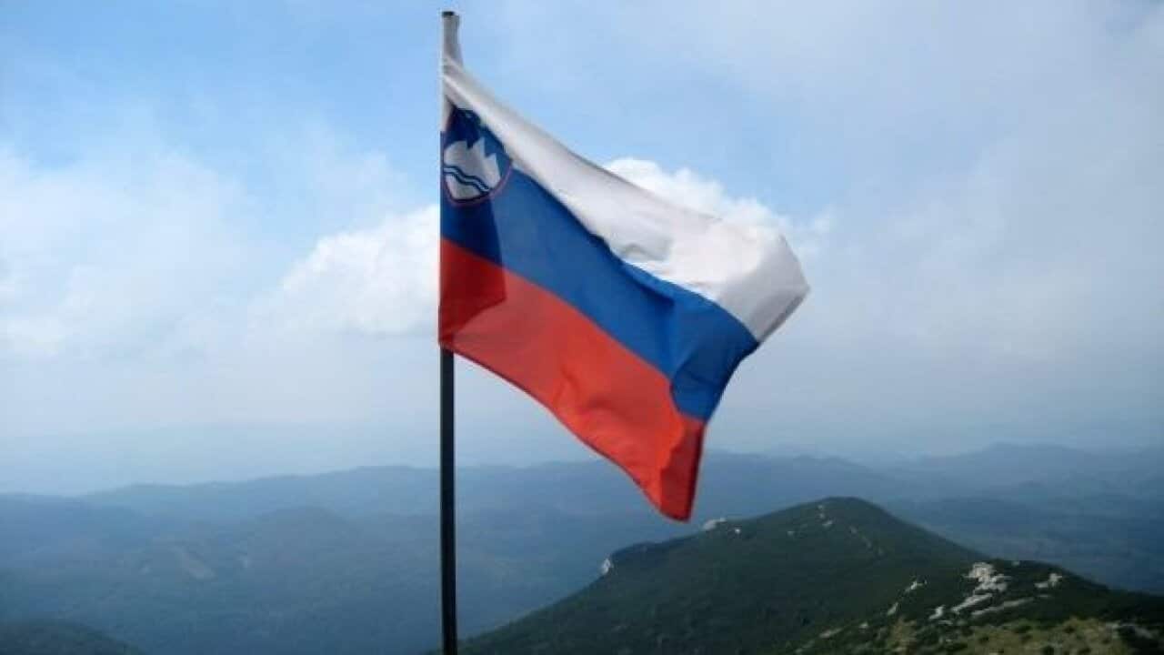 Slovenian flag on Mt Snežnik