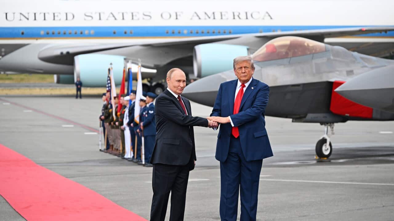 Russian President Vladimir Putin and U.S. President Donald Trump meet at Elmendorf-Richardson Air Force Base.