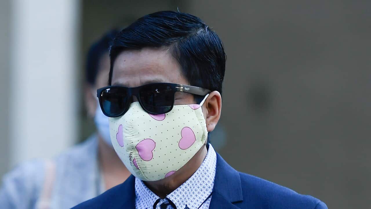 My Ut Trinh is seen departing the Brisbane District Court on Tuesday, 13 July, 2021. 