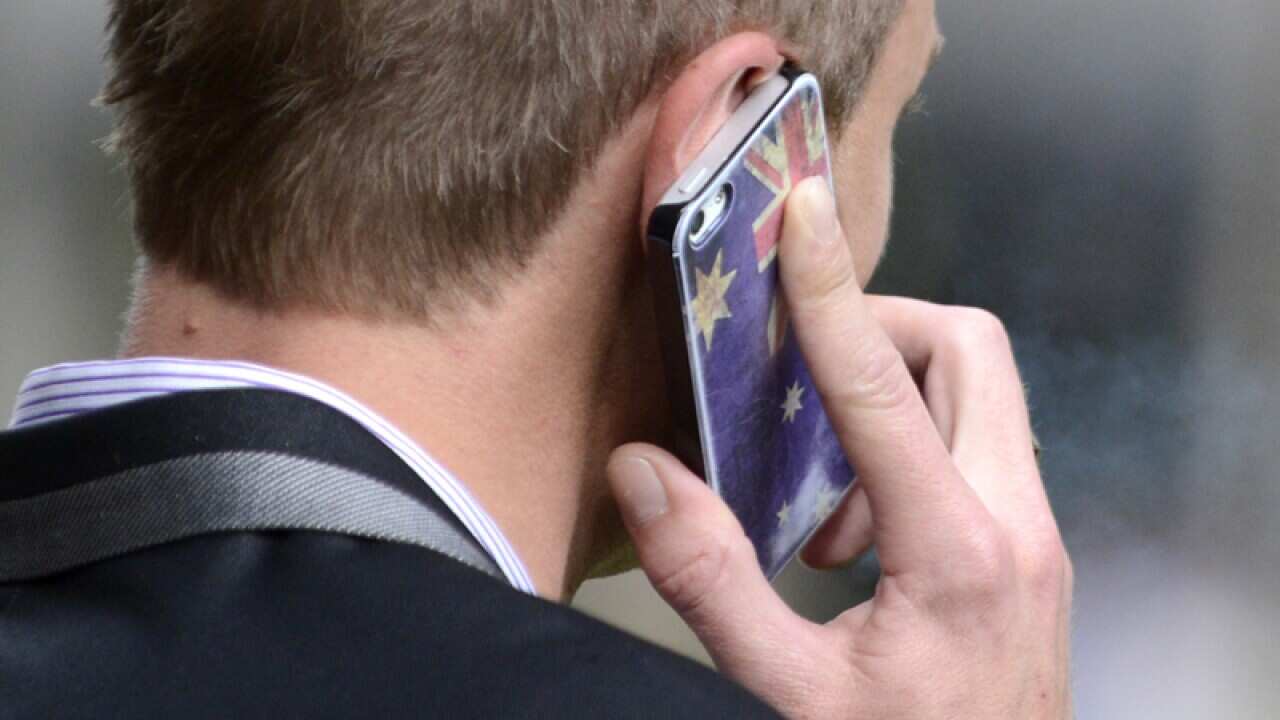 A man talks on his mobile phone in Brisbane