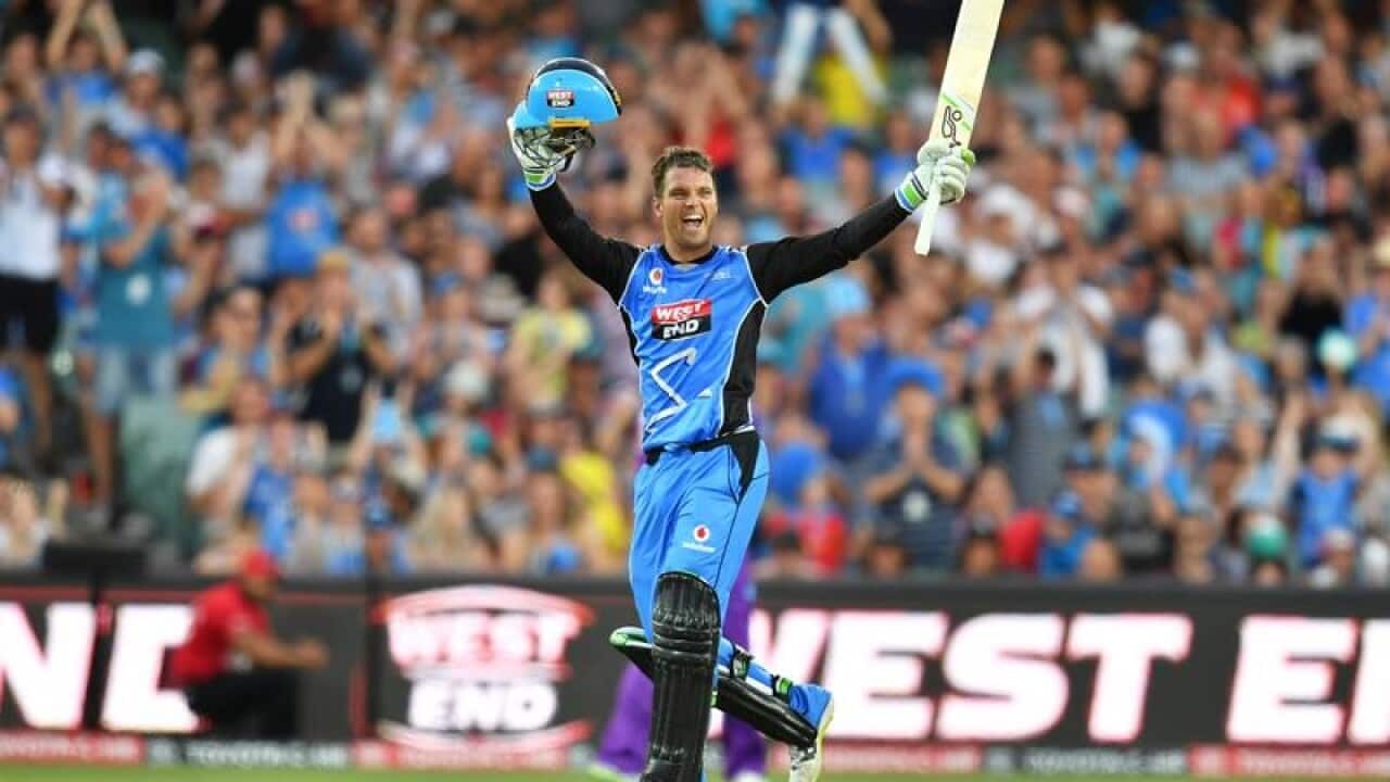 Alex Carey of the Adelaide Strikers celebrates his 100 runs.