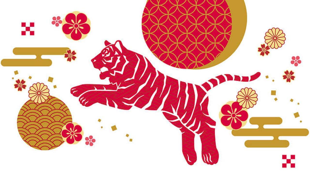 Illustration material of the silhouette of a bouncing tiger seen from the side. Background material with Japanese-style pattern of red and gold.
