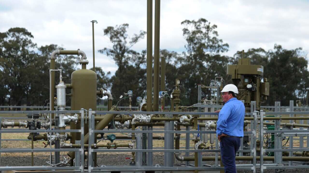 Santos staff at the Tinsfield coal seam gas pilot well