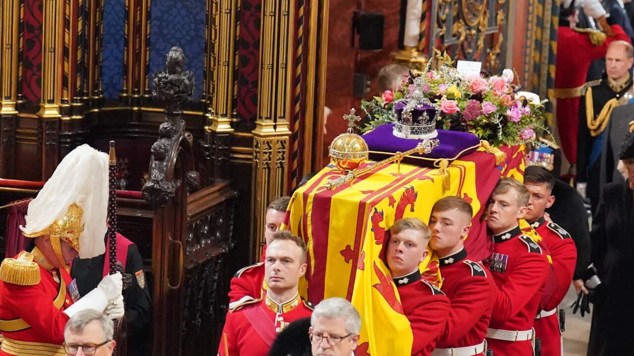 The Queen’s coffin is carried into her state funeral (AAP).