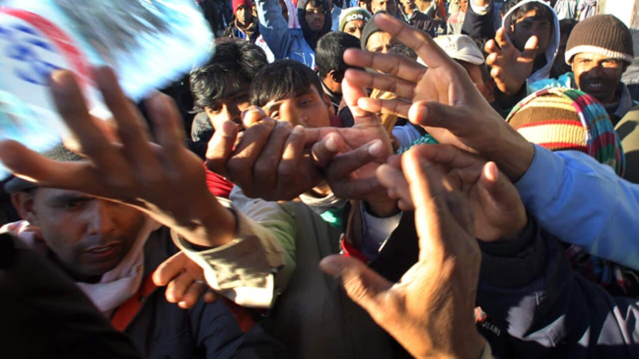 tunis_libya_refugees_110303_B_EPA_2061355924